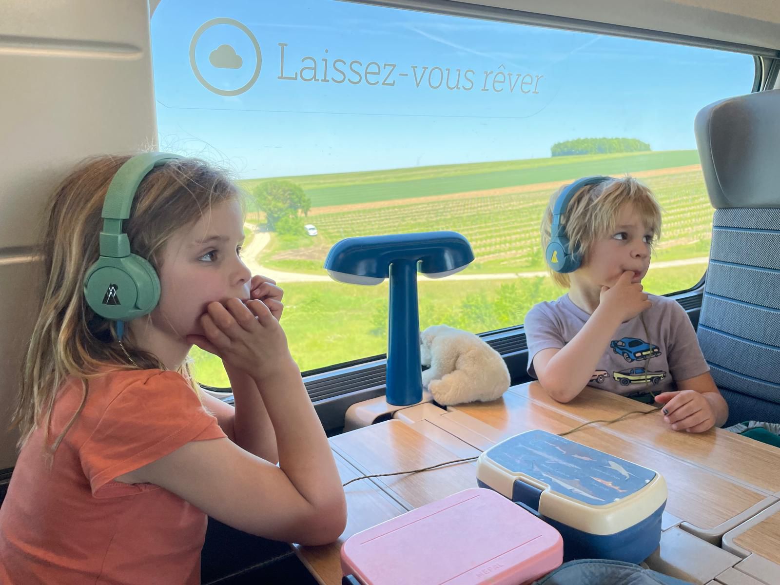 Kids on a train with POGS
